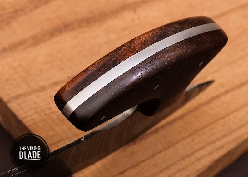 Premium curved Damascus Ulu knife showcased with handcrafted sheath and wooden display base