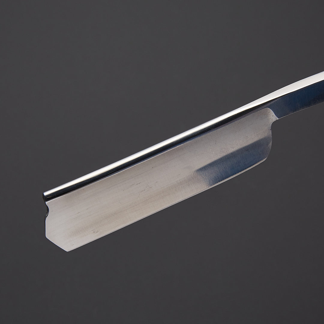 Luxury shaving razor crafted from J2 steel presented in elegant gift box with leather sheath, ideal for professional barbers and gifting.
