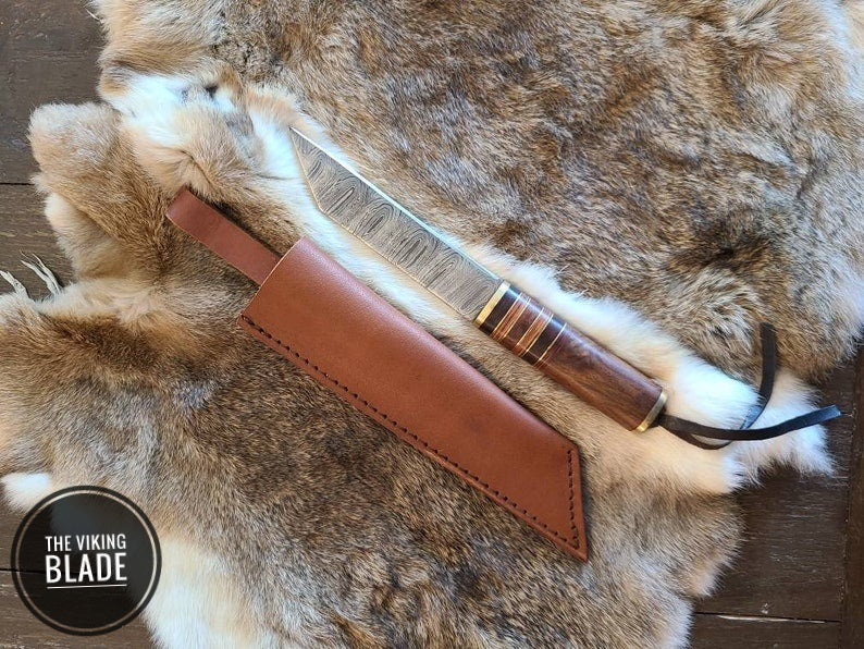 Damascus Seax featuring Walnut handles with Decorative Brass spacers Includes a premium leather sheath