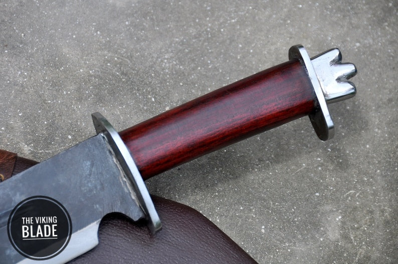Forged Viking Seax knife with long 12 inch blade and durable leather sheath.