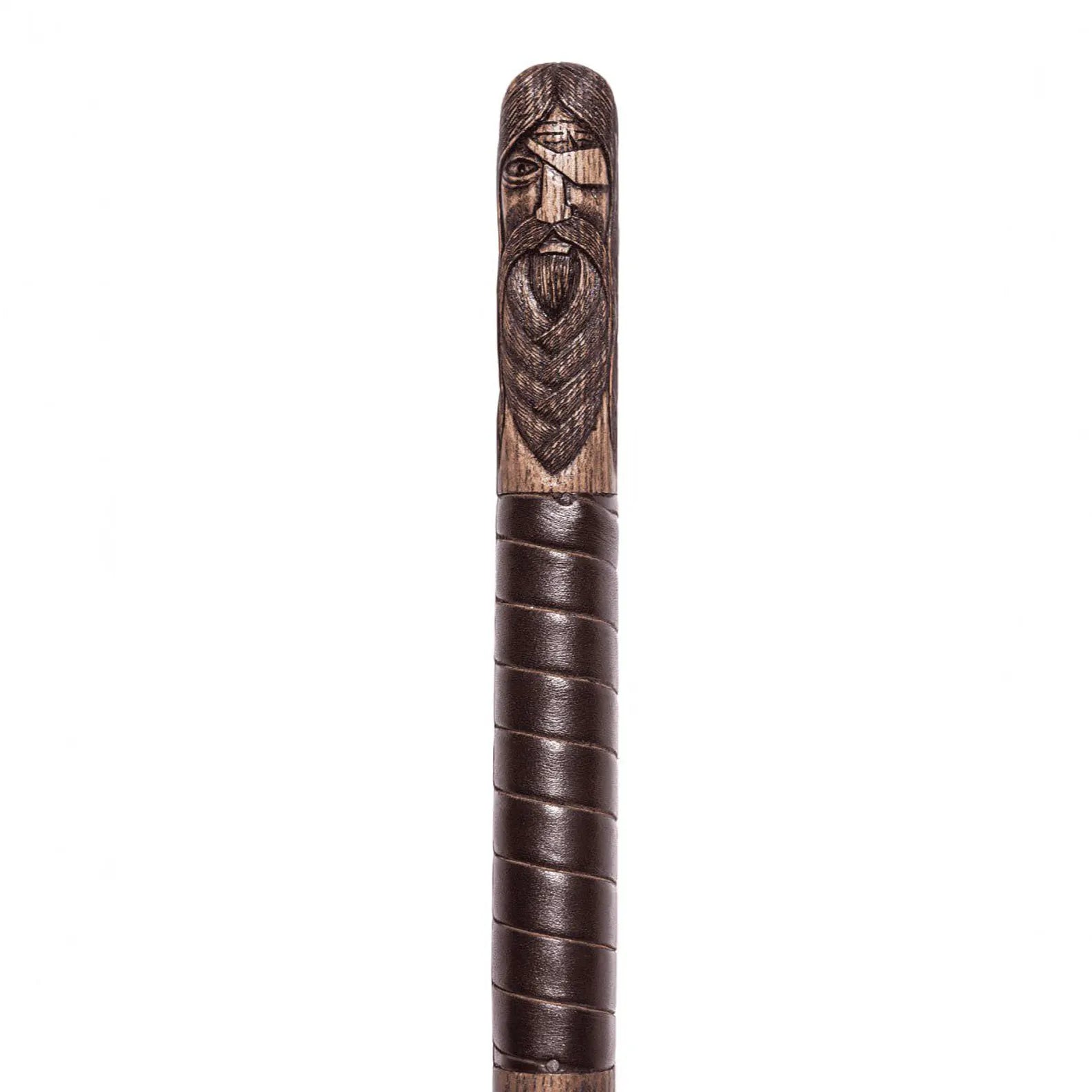 Wooden staff with carved face and leather wrapping on a white background