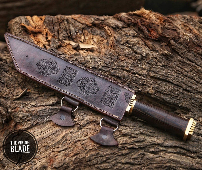 Handmade Viking Seax knife with carbon steel blade and leather sheath.
