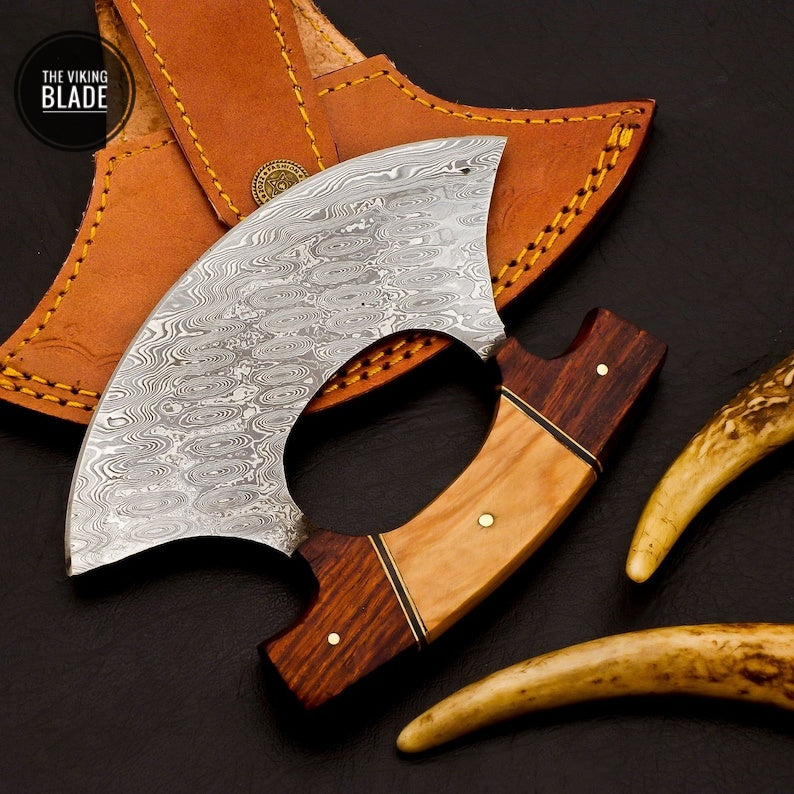 Custom Damascus Ulu knife paired with genuine leather sheath and wooden handle