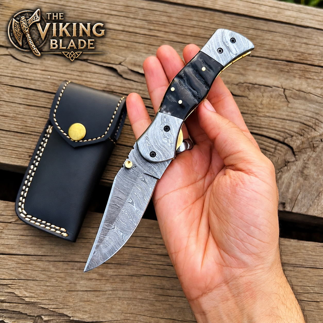 Custom Damascus folding knife with leather sheath and Ram Horn handle