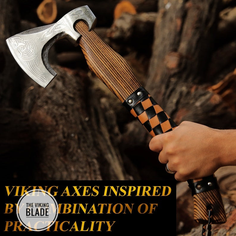 A hand forged carbon steel Viking style axe with a leather sheath, the axe has a patterned handle with a wooden appearance and a black leather stitched sheath.