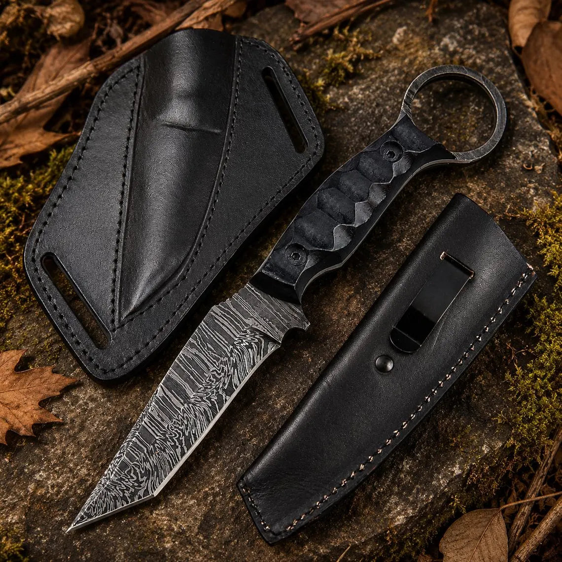 Knife with black leather sheath on a textured surface with leaves