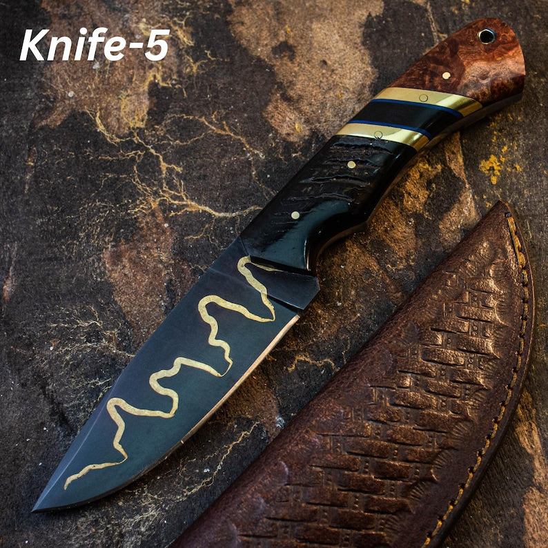 A custom handmade hunting Viking knife with a black and brown handle, a grooved pattern on the blade, and a cow leather sheath.