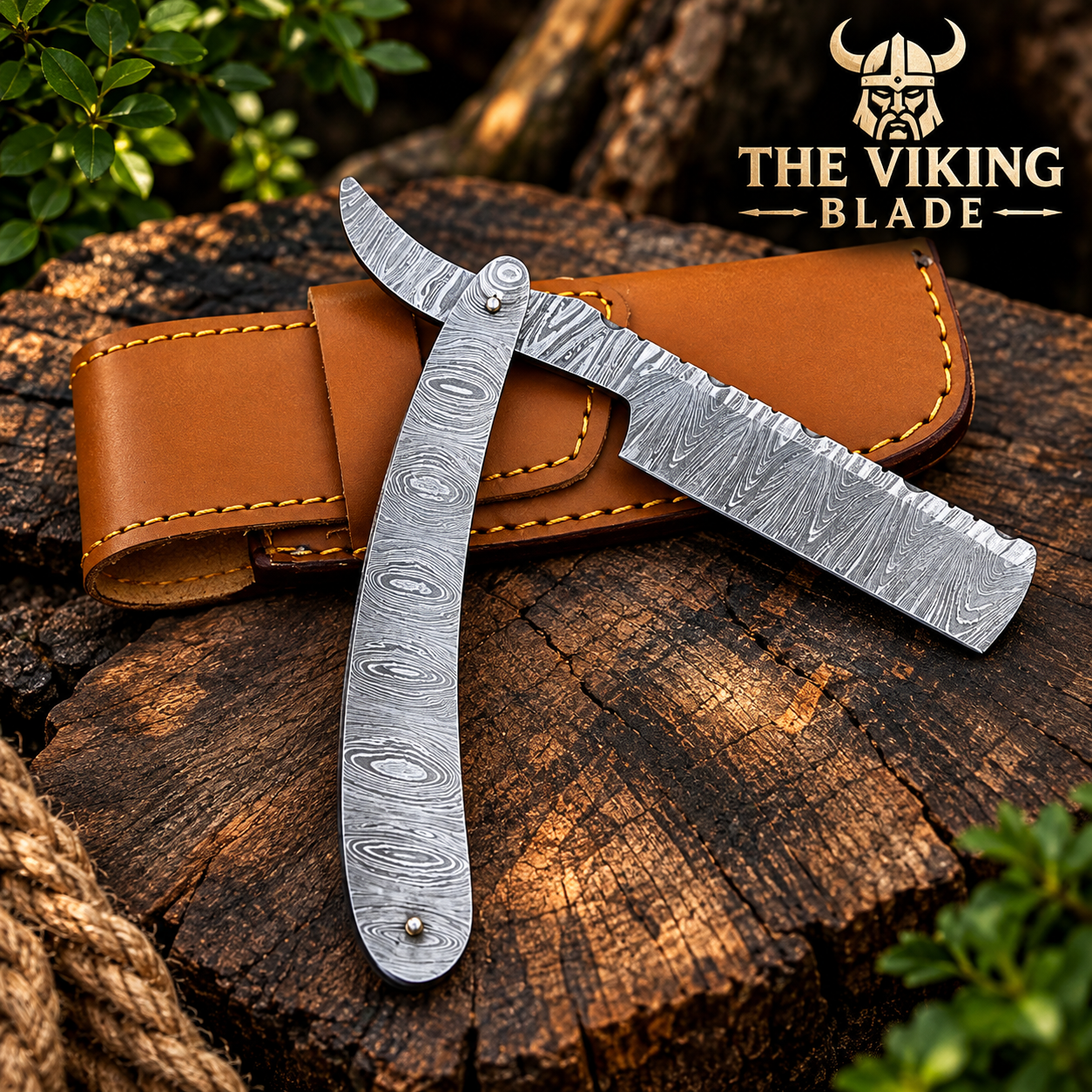 A folding straight razor with a patterned steel handle and matching steel blade, displayed on a brown leather sheath over a rustic wooden log. The brand logo 'THE VIKING BLADE' is visible in the top right corner.