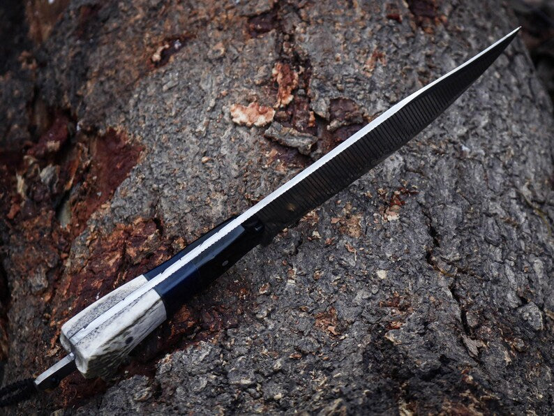 Knife blade on a textured surface
