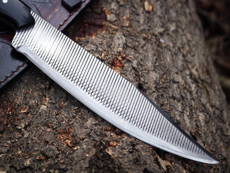 Knife blade on a textured surface