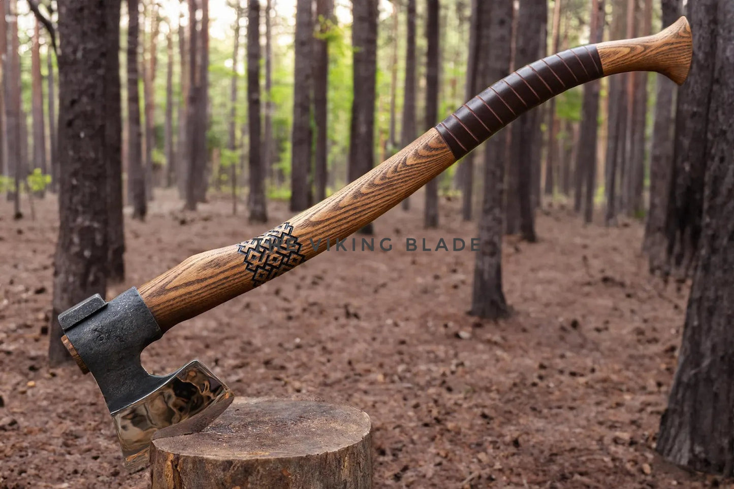 Wooden-handled axe on a log with 'King Blades' branding in a forest setting