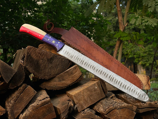 Large knife with a sheath on a pile of wood in a forest setting