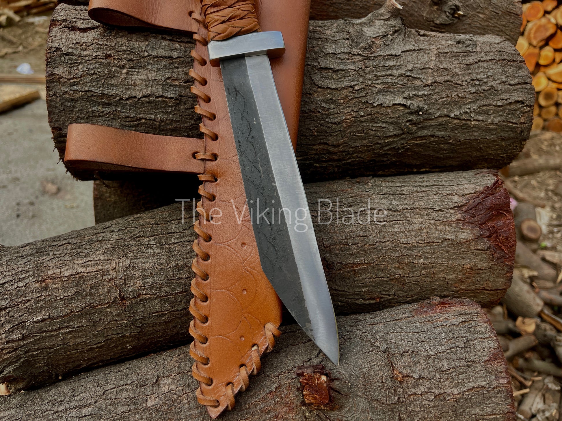 Compact hand forged Troll Seax survival knife for camping and bushcraft