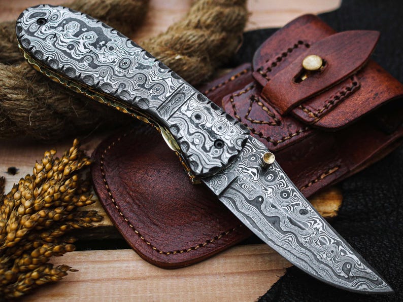 Handcrafted Damascus Steel Folding Pocket Knife with Premium Leather Pouch