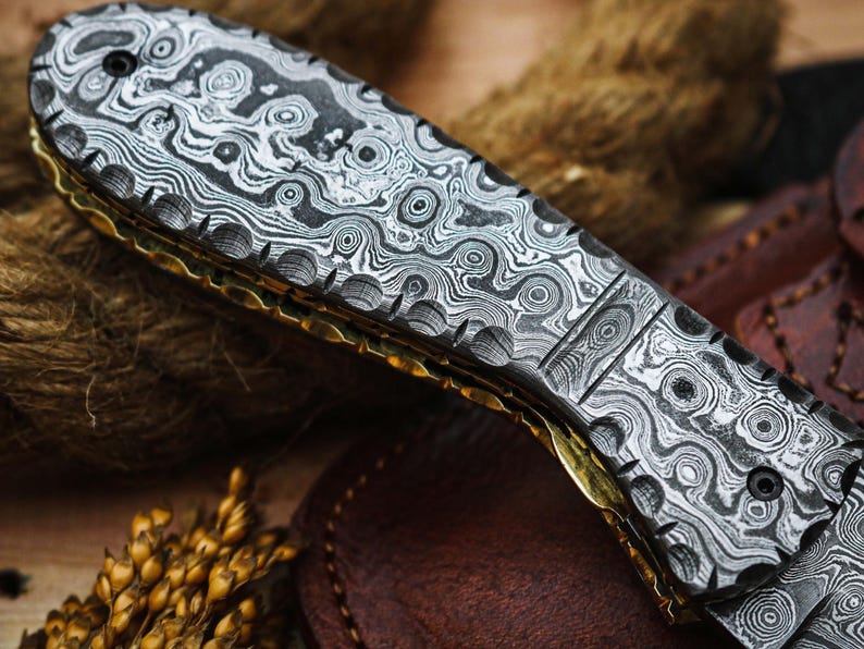 Handcrafted Damascus Steel Folding Pocket Knife with Premium Leather Pouch