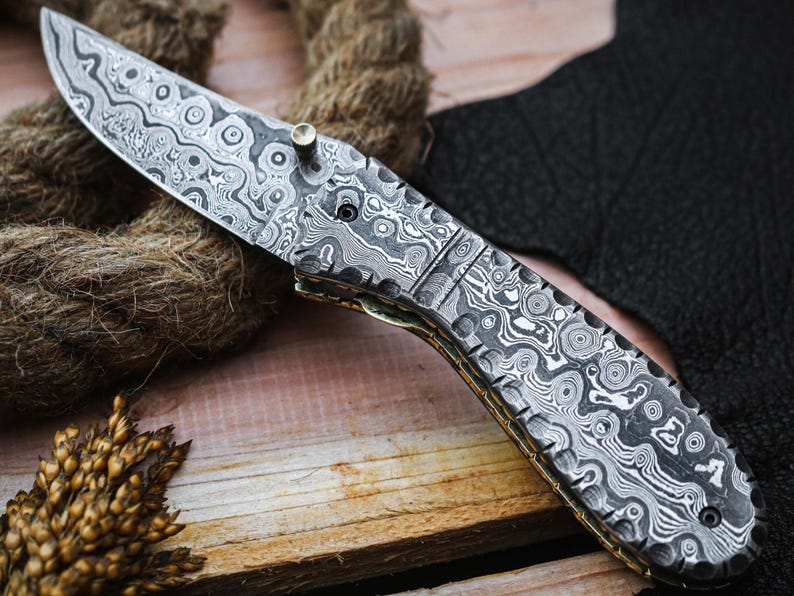 Handcrafted Damascus Steel Folding Pocket Knife with Premium Leather Pouch