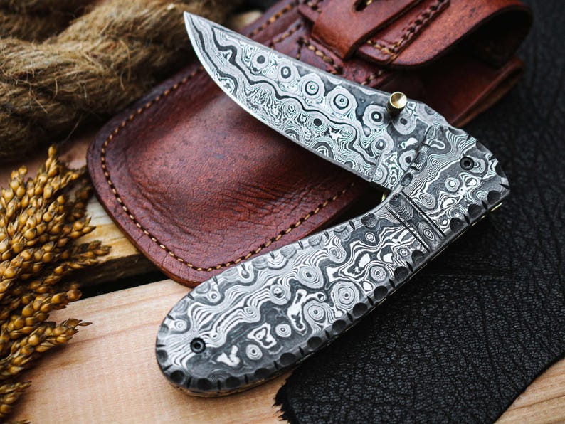 Handcrafted Damascus Steel Folding Pocket Knife with Premium Leather Pouch