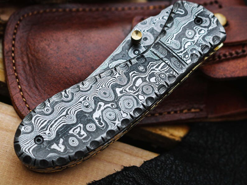 Handcrafted Damascus Steel Folding Pocket Knife with Premium Leather Pouch