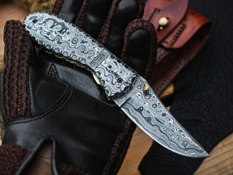 Handcrafted Damascus Steel Folding Pocket Knife with Premium Leather Pouch