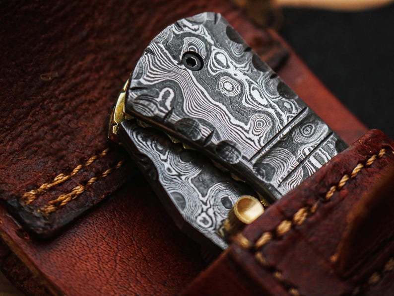 Handcrafted Damascus Steel Folding Pocket Knife with Premium Leather Pouch