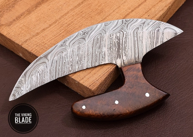 Handcrafted Damascus Ulu knife gift edition with detailed blade pattern and display stand