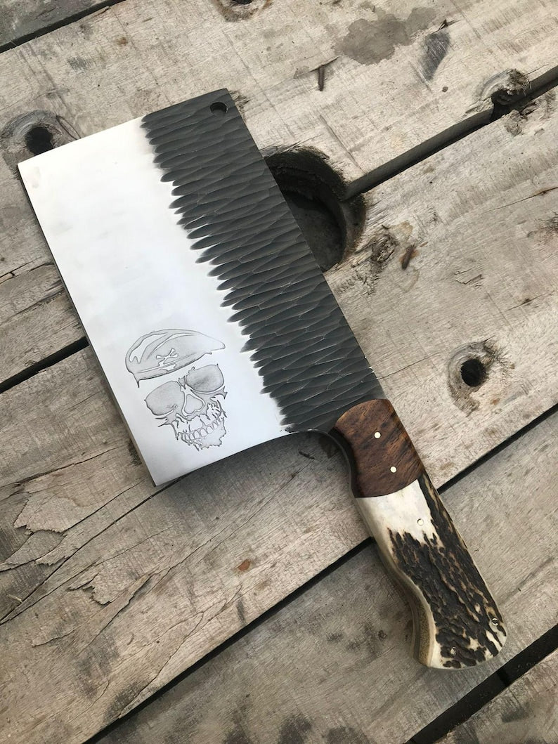 Butcher knife with wooden handle on a wooden surface