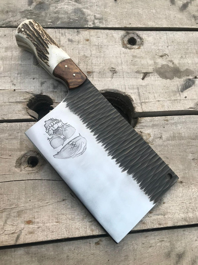 Large cleaver with a decorative handle on a wooden surface