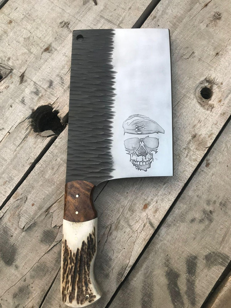 Butcher knife with decorative handle on a wooden surface