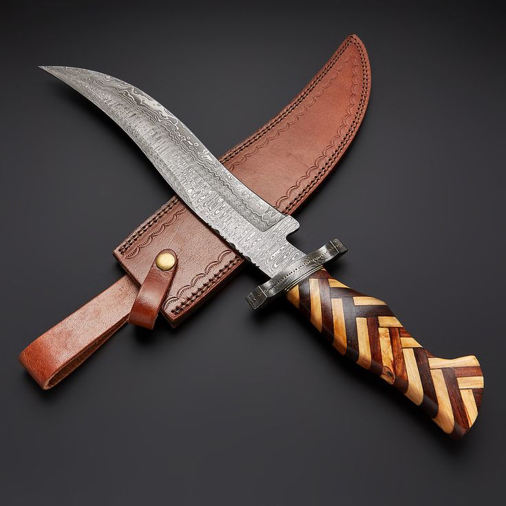 Decorative knife with a wooden handle and leather sheath on a dark background