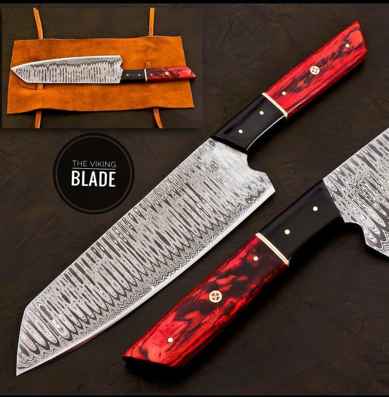 A hand forged Japanese Bunka kitchen knife with a black wood handle featuring rosewood bolsters and brass rivets, displayed with a leather roll kit.