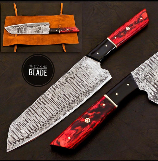 A hand forged Japanese Bunka kitchen knife with a black wood handle featuring rosewood bolsters and brass rivets, displayed with a leather roll kit.