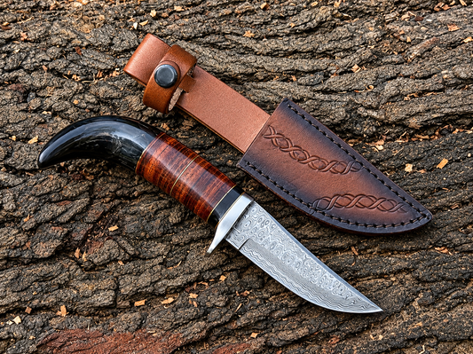 Overall Length: Approx. 9 inches

Blade Length: Approx. 4 inches

Handle Length: Approx. 5 inches

Blade Material: 1095 High Carbon Damascus Steel

Blade Style: Clip Point

Handle Material: Buffalo Horn & Leather

Sheath: 100% Genuine Hand-Stitched Leather