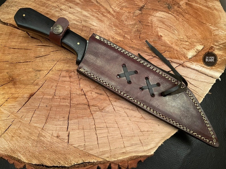 Viking-inspired Damascus Seax knife with genuine leather sheath included.