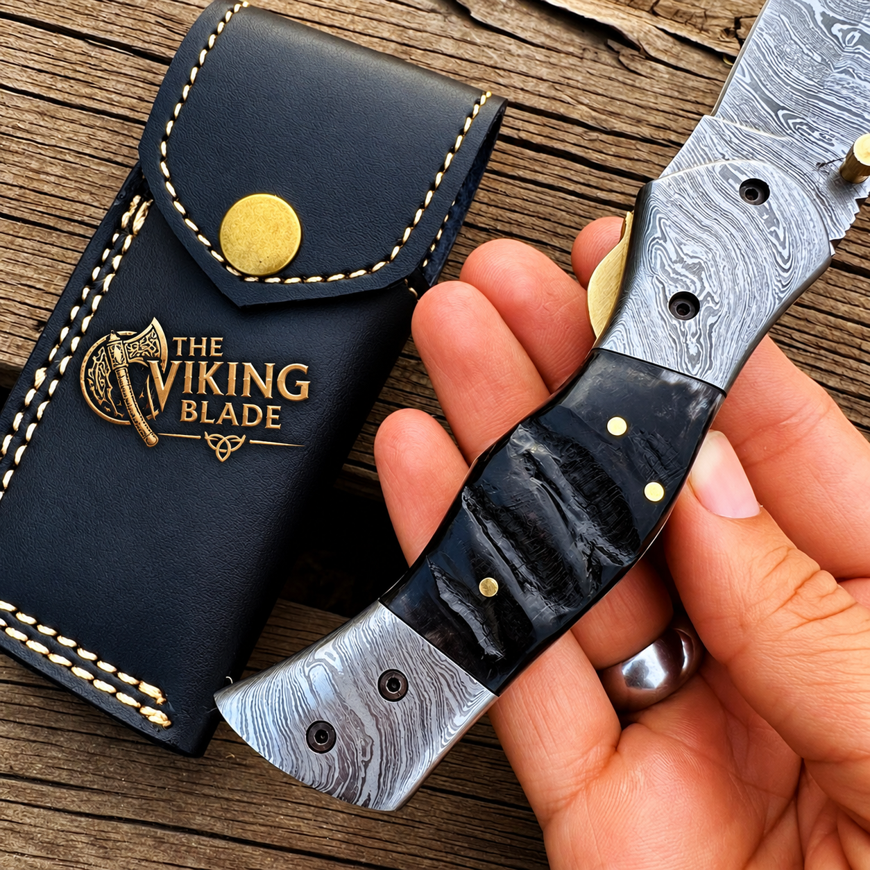 Handmade Damascus steel folding knife with unique handle