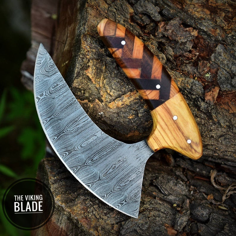 Premium Damascus ULU kitchen knife featuring curved blade and handcrafted leather sheath