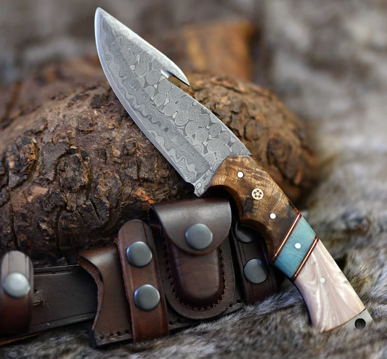 The Hunter's Edge: 8.25-Inch Gut Hook Skinning Hunting Knife with Raindrops Damascus Steel Blade, Rosewood and Epoxy Resin Handle | The Viking Blade |