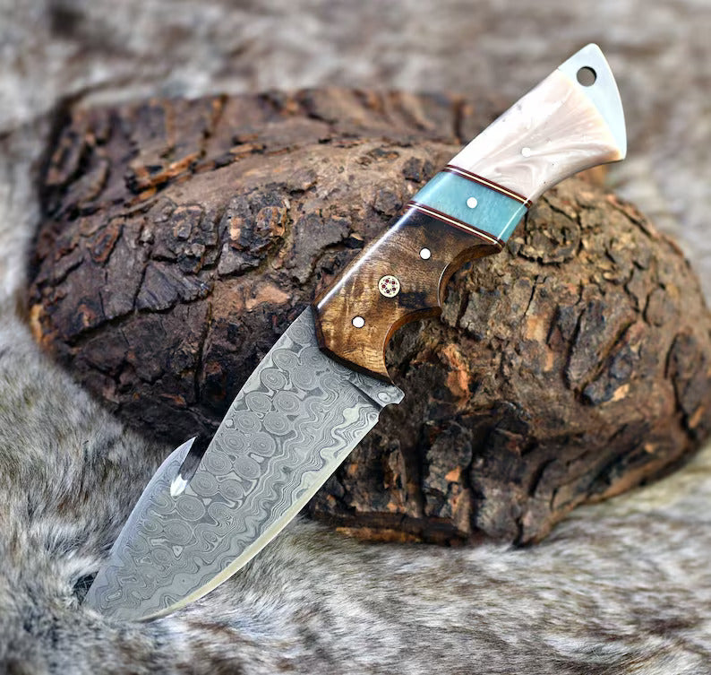 The Hunter's Edge: 8.25-Inch Gut Hook Skinning Hunting Knife with Raindrops Damascus Steel Blade, Rosewood and Epoxy Resin Handle | The Viking Blade |