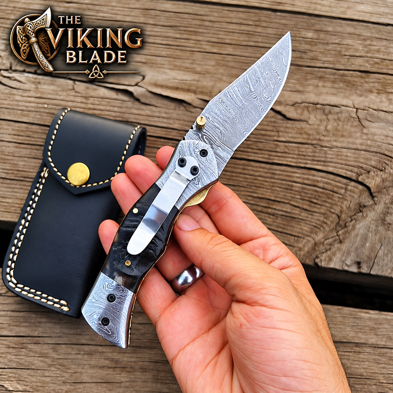The Viking Blade custom handmade Damascus folding knife with Ram Horn handle