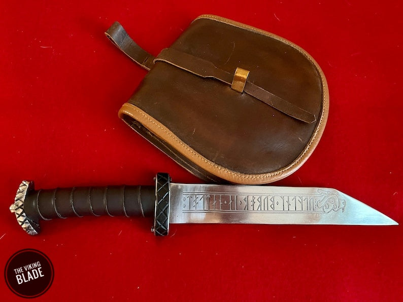 Viking Seax with leather wrapped handle and blade engraved with runes. Ready to sharpen with a 1 mm edge | The Viking Blade |