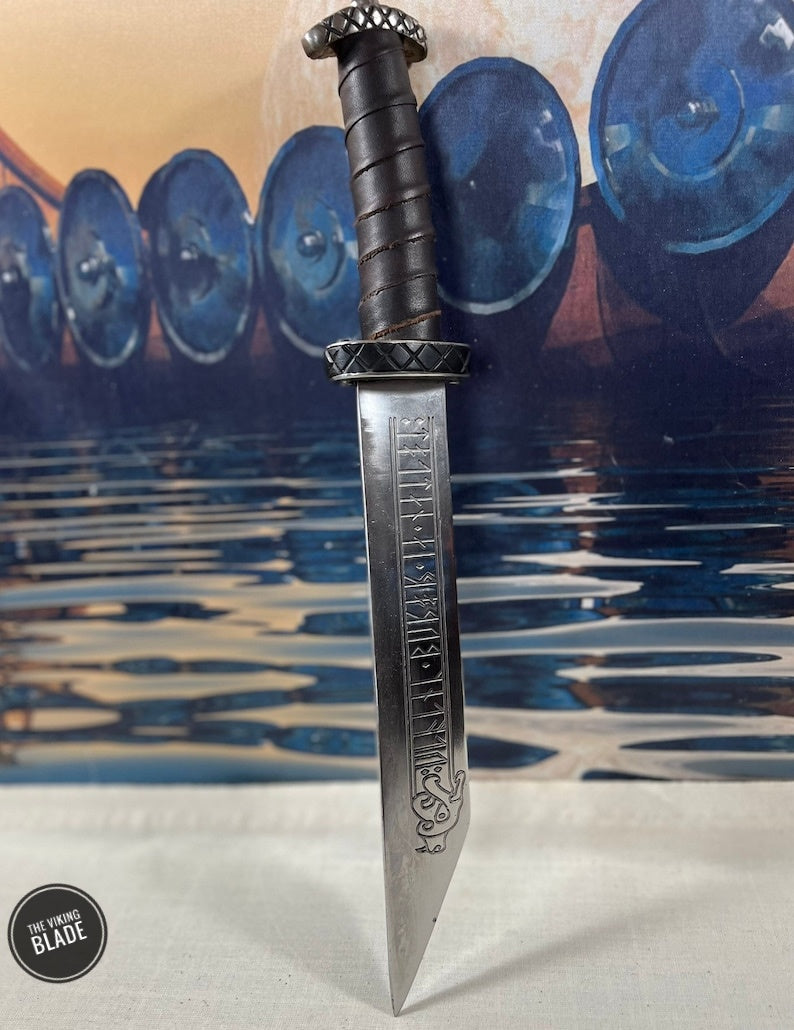 Viking Seax with leather wrapped handle and blade engraved with runes. Ready to sharpen with a 1 mm edge | The Viking Blade |