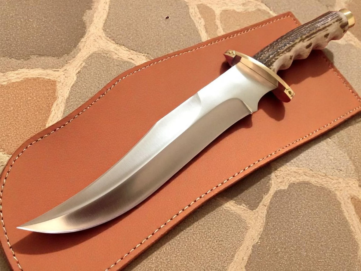 Buckeye knife with antler handle on leather sheath