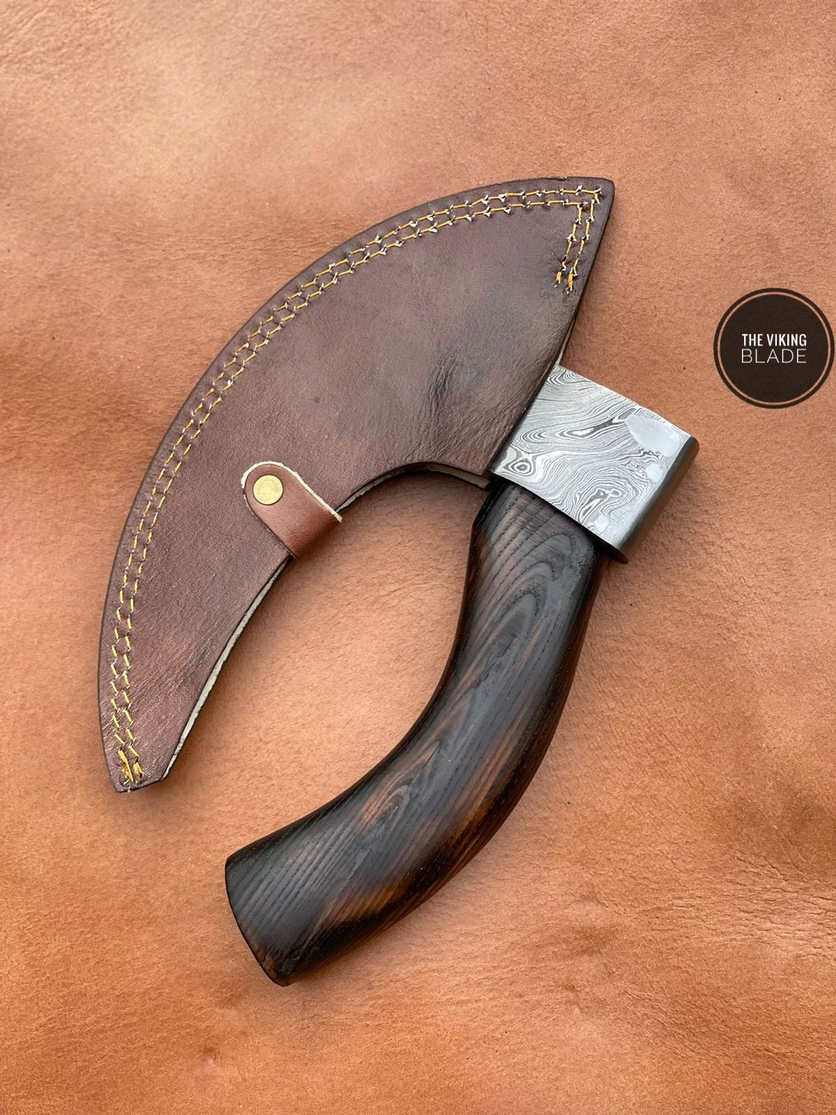 Damascus pizza cutter axe with genuine leather sheath handmade kitchen tool for pizza and flatbread slicing.