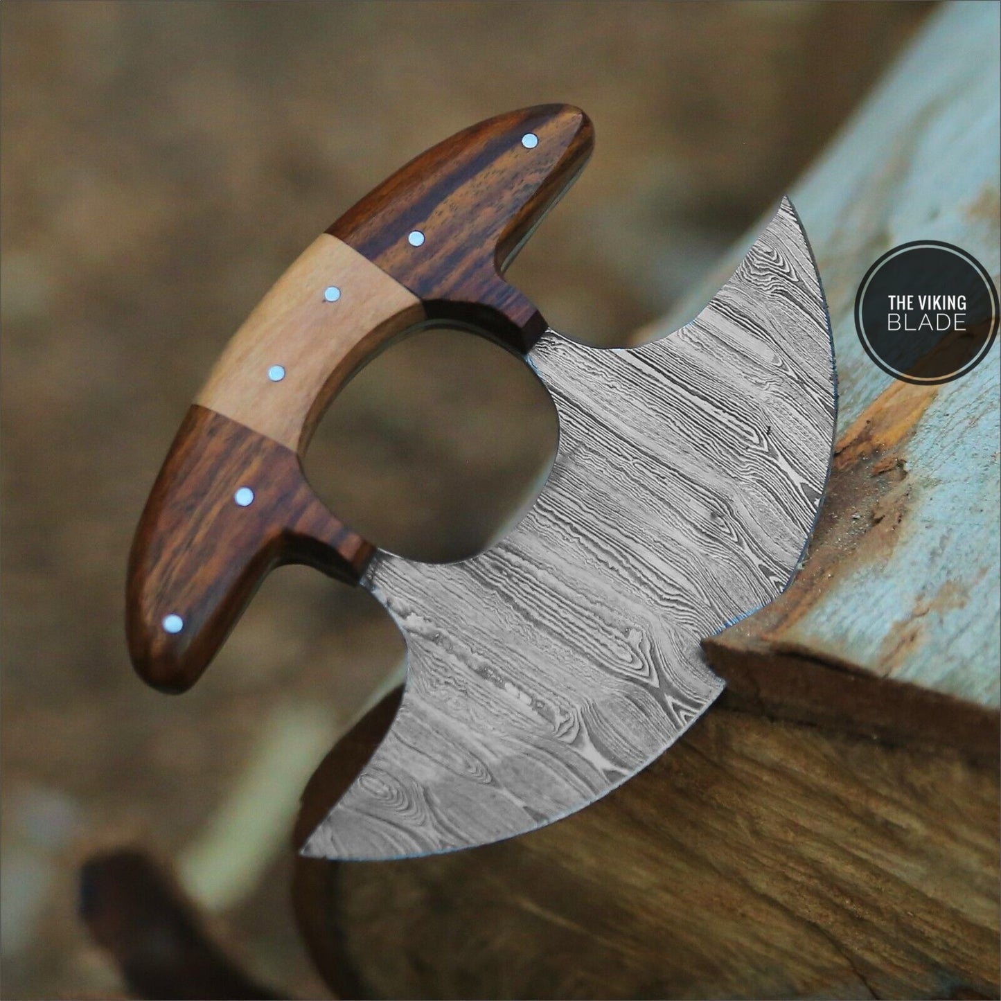 Damascus steel pattern on handmade Ulu knife blade