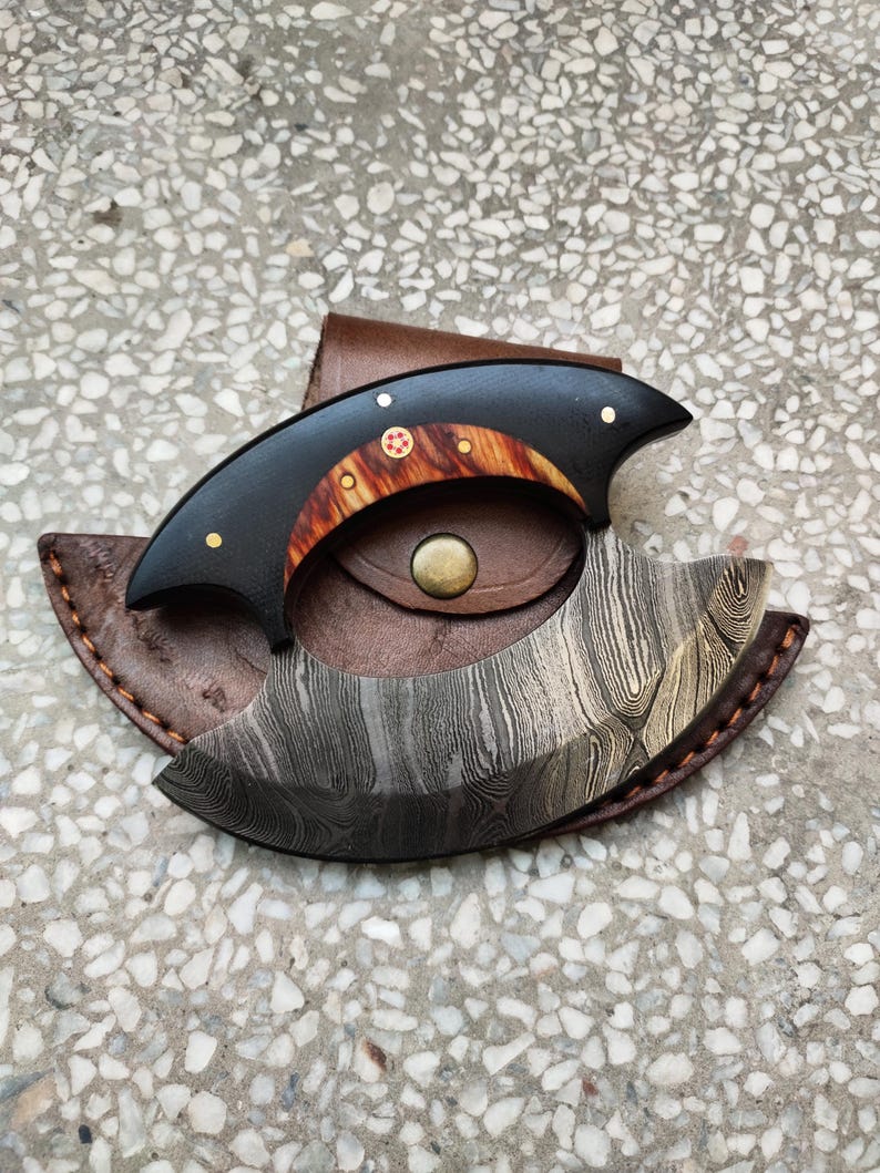 handmade Damascus steel Ullu hunting knife with detailed blade pattern