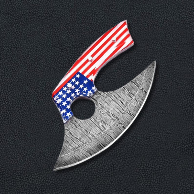 Close-up of Viking Blade Damascus steel Ullu knife showing wave pattern blade