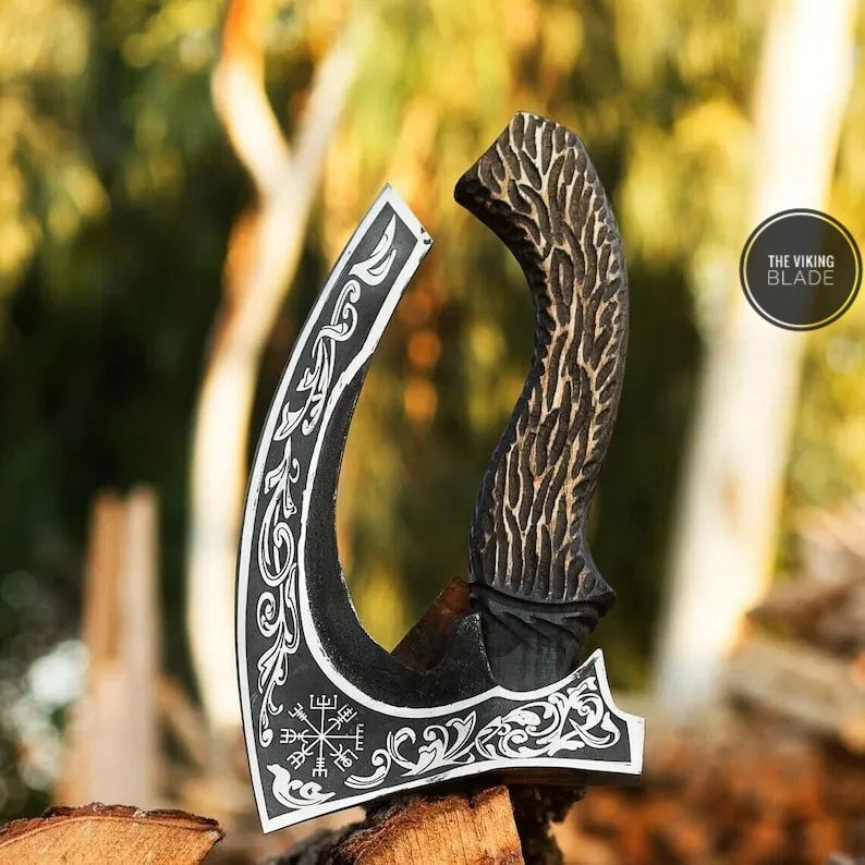 Forged carbon steel pizza axe cutter handmade kitchen tool with strong wooden handle for smooth slicing.