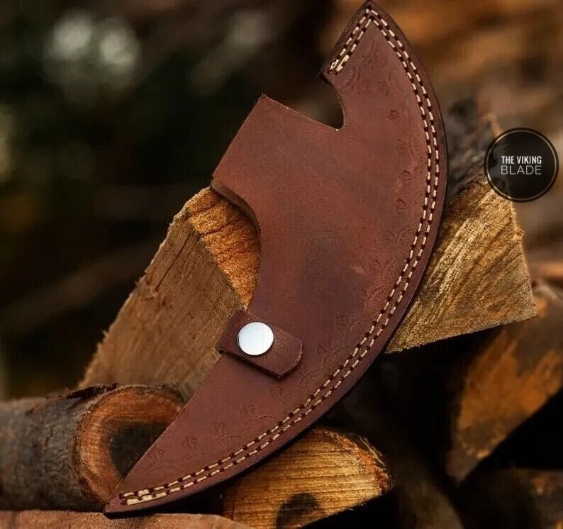 Hand forged pizza axe tomahawk cutter with Viking blade design and wooden handle for slicing pizza easily.