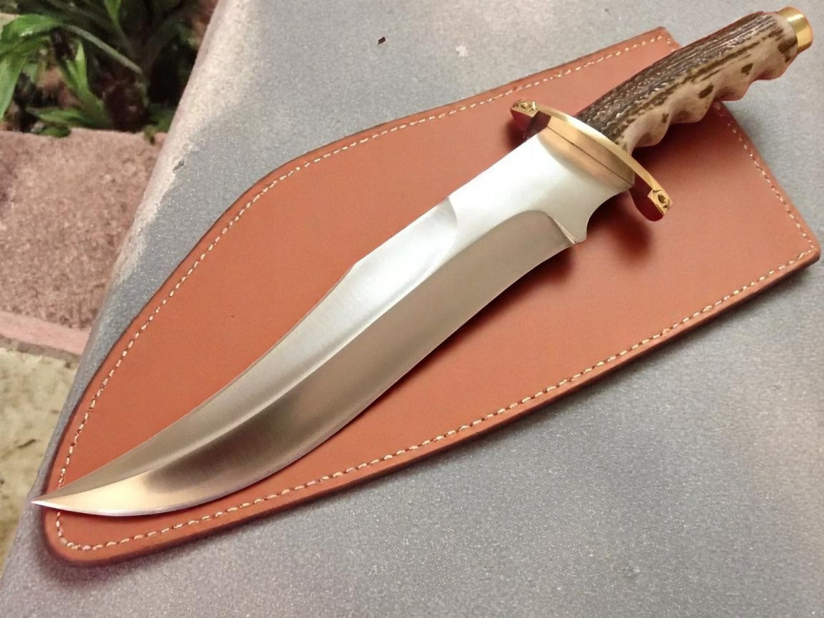 Bowie knife with antler handle on leather sheath