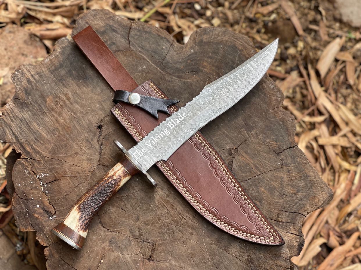 Custom Damascus Bowie Knife with Carved Elk Horn Handle and Tooled Leather Sheath
