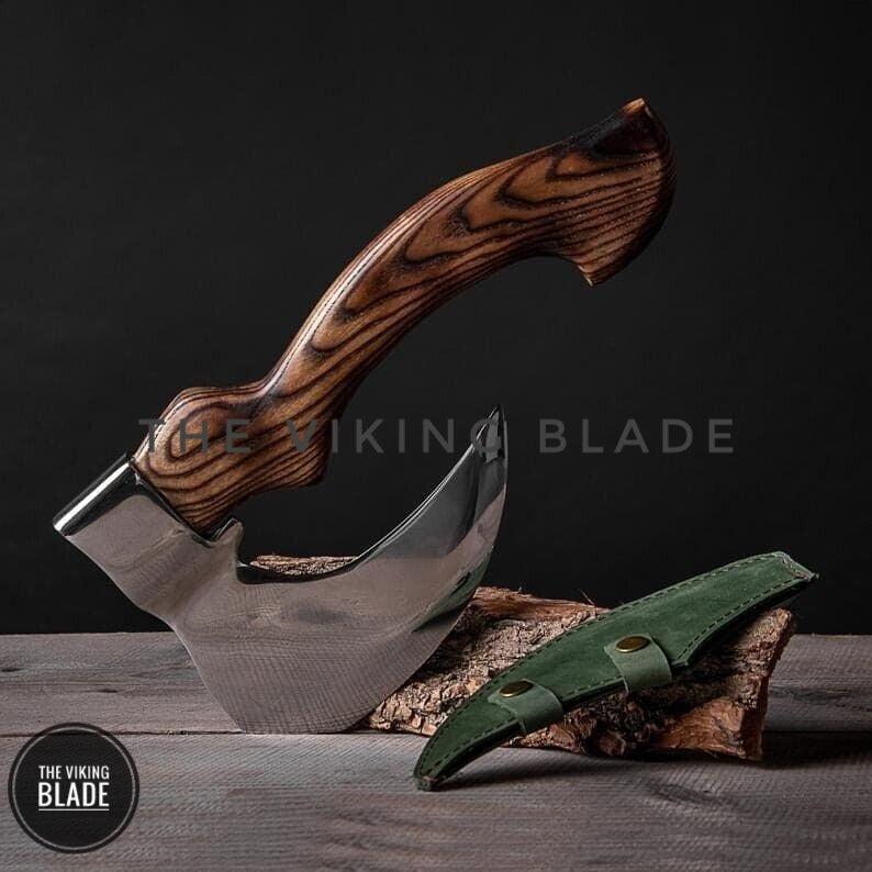 Viking blade pizza axe cutter with leather sheath and wooden handle, premium handmade kitchen tool for cutting pizza.